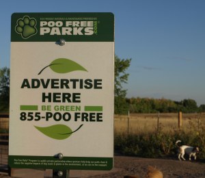 Sign that reads "Poo Free Parks"  Advertise Here.  Be Green.  855-POO-FREE.  