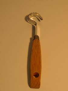 Image:  unexplained tool with hook at the end.