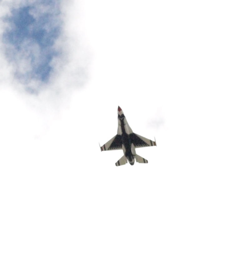 Image: zoomed in photo of underside of fighter jet.