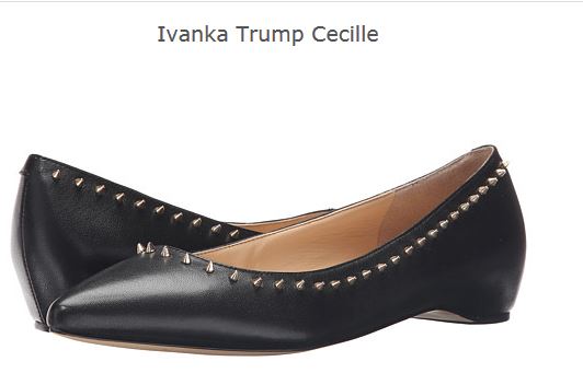 {Image: Ladies flat shoes in black with a row of spikes around the opening.}