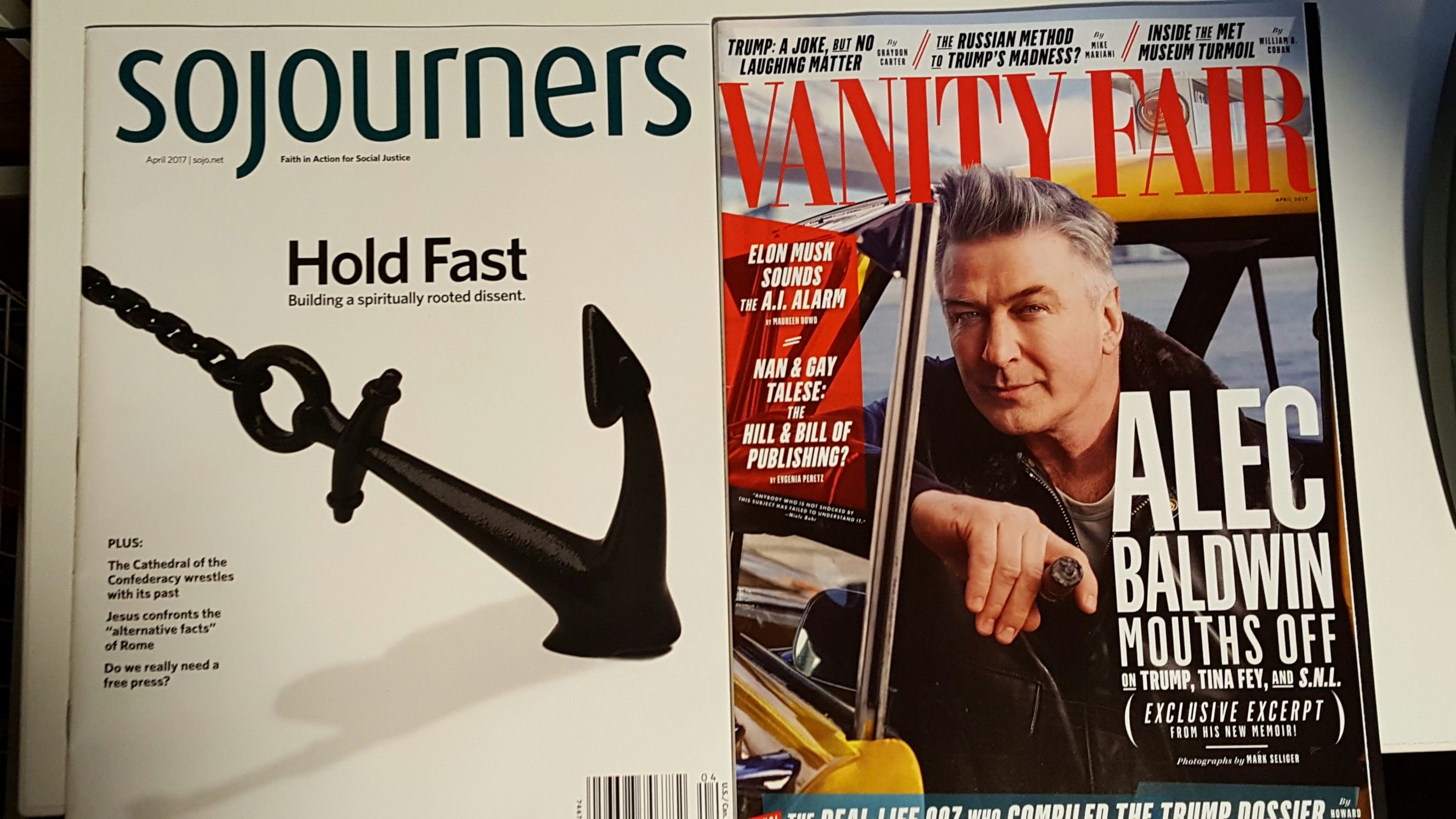 Image: Photo of Sojourners magazine next to Vanity Fair. 